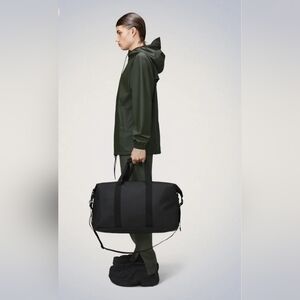 RAINS Black Hilo Waterproof Large Duffle Weekend Bag.